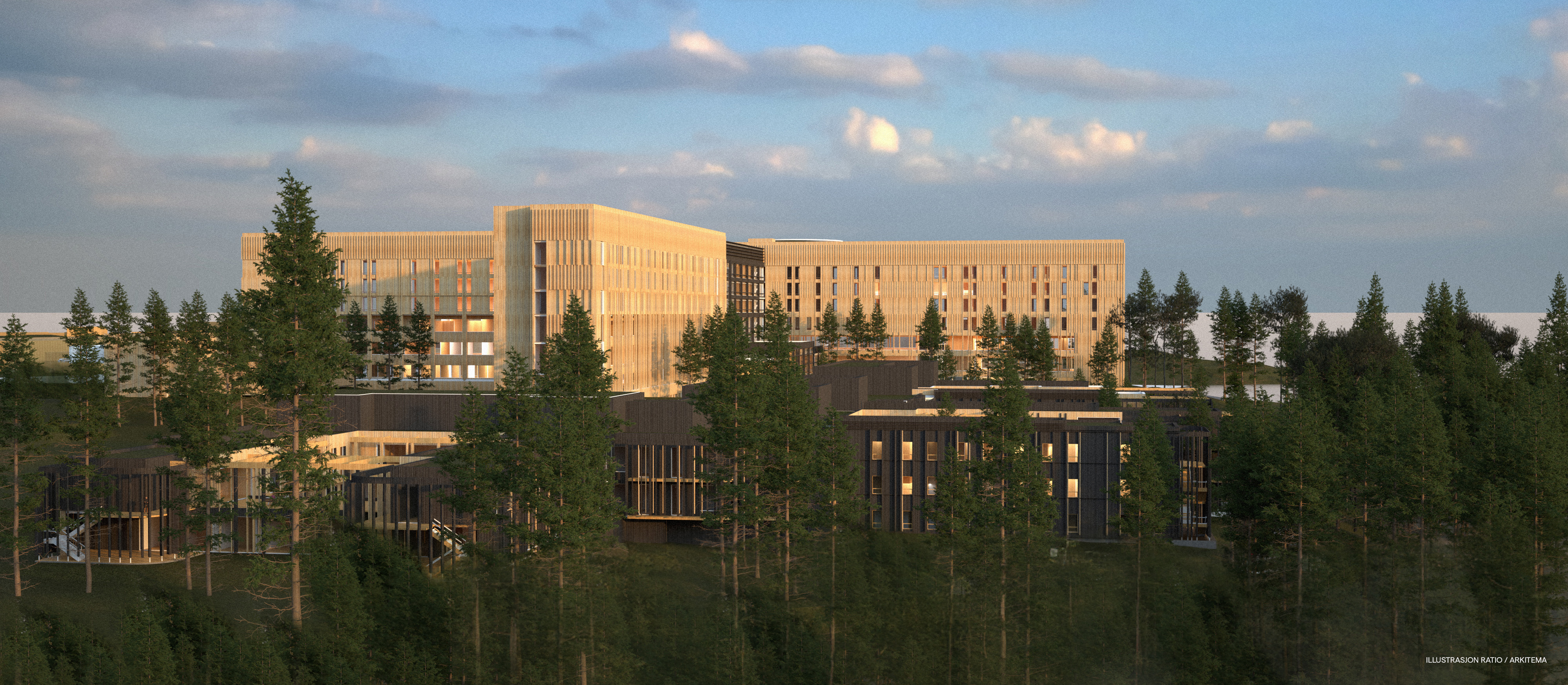 En stor bygning med trær foran seg