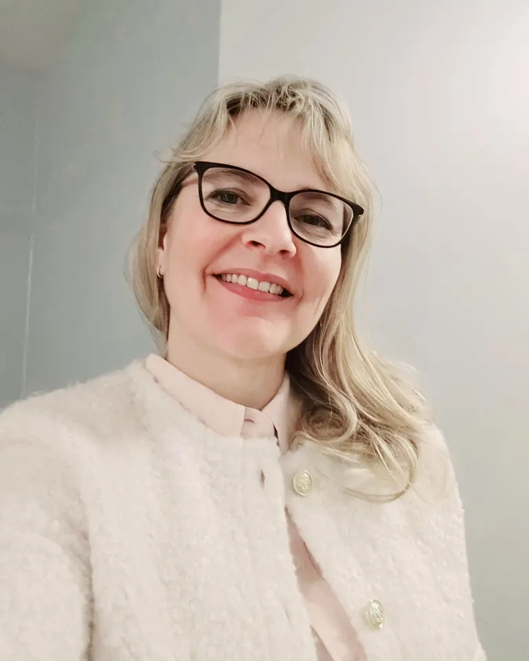 Bilde av en kvinne som smiler