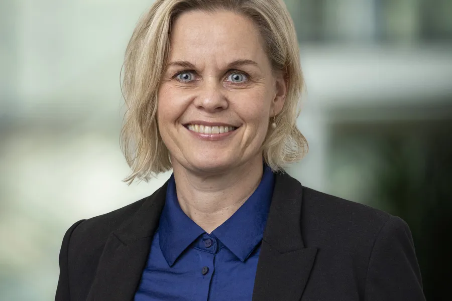 Profilbilde smilende kvinne
