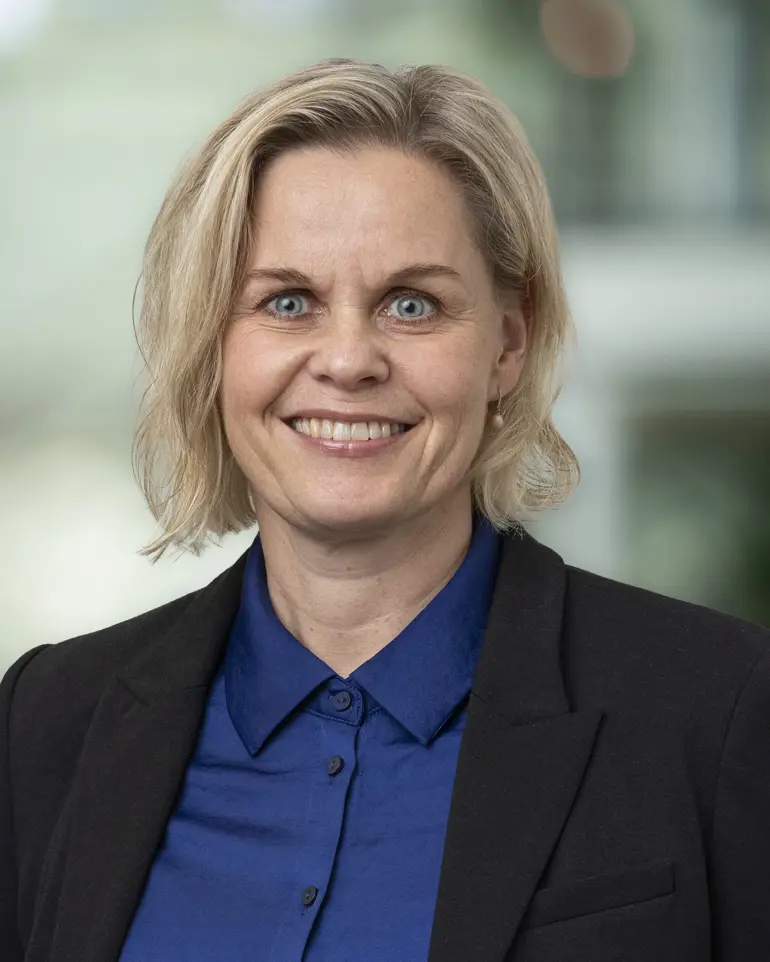 Profilbilde smilende kvinne