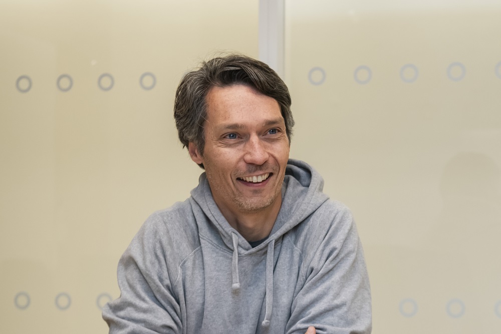 A man smiling for the camera