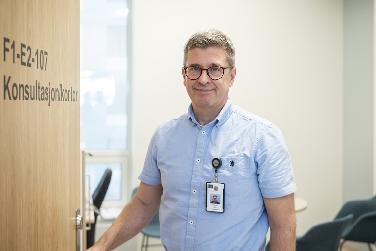 A man wearing glasses