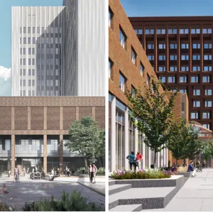 En gruppe mennesker som går rundt en stor bygning