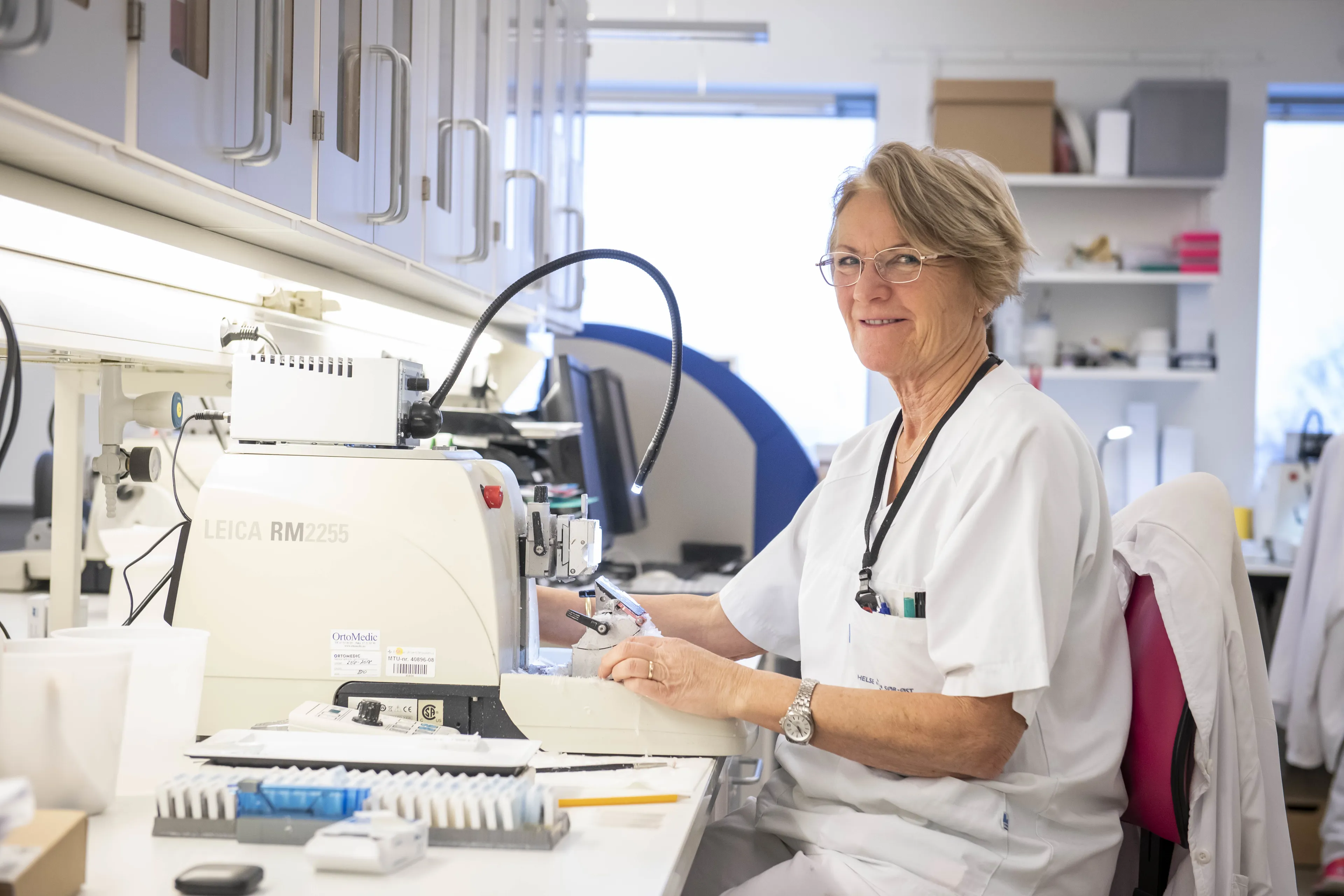 A man in a white coat