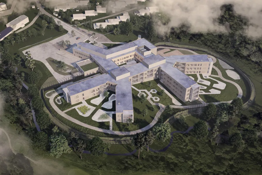 En stor bygning med et basseng foran seg